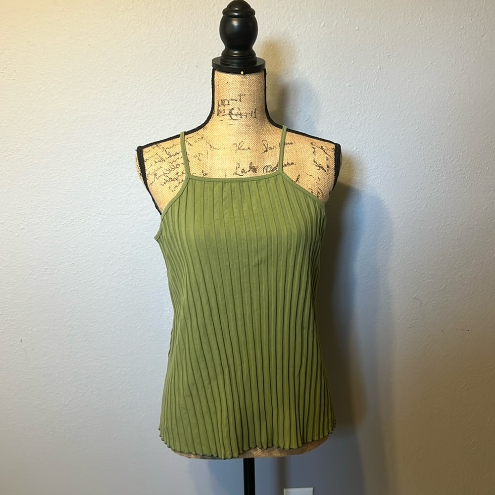 A new day, green tank size XS super stretchy fits like a L.